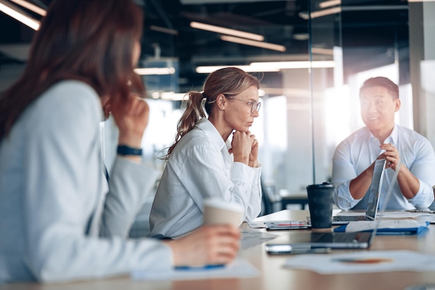 Group of diverse business people have meeting in the modern office