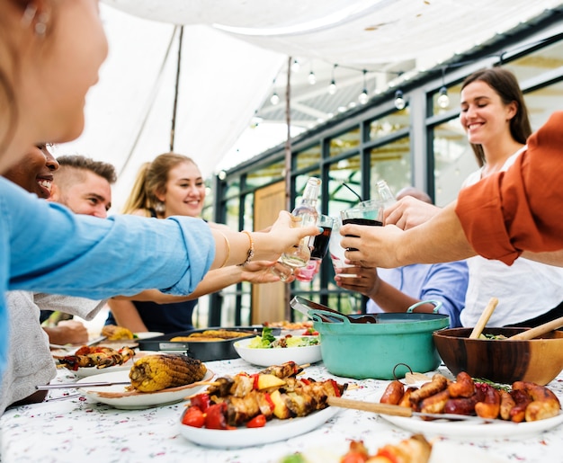 Group of diverse friends enjoying summer party together