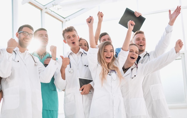 Group of diverse medical employees showing their success