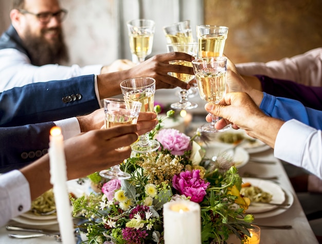 Group of Diverse People Clinking Wine Glasses Together Congratulations Celebration