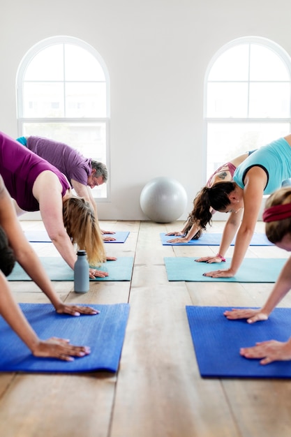 Group of diverse people in yoga class