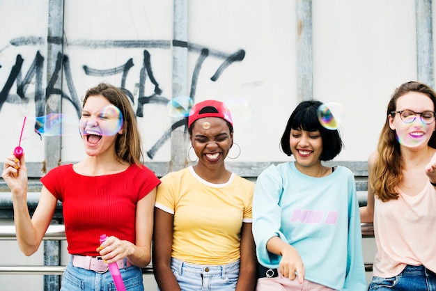 A group of diverse woman friends having fun together