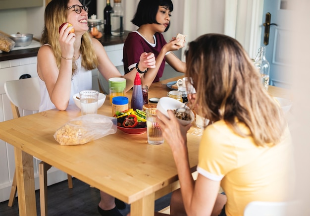 A group of diverse women having breakfast together