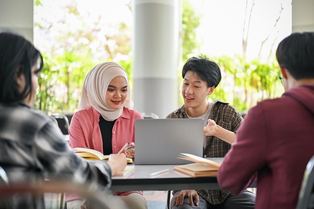 A group of diversity Asian college students are working on a school group project together