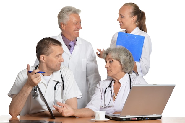 A group of doctors discussing at the table