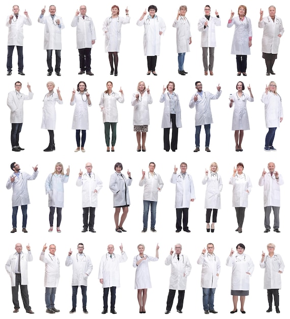 Group of doctors in full length isolated on white