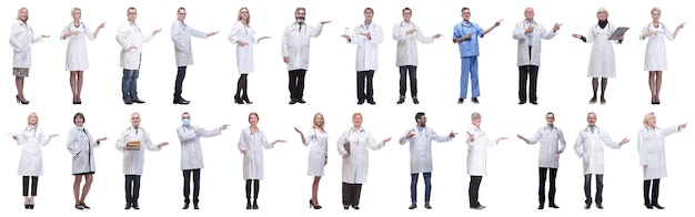 Group of doctors in full length isolated on white