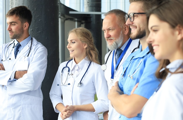 Group of doctors standing at the medical office.