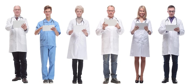 Group of doctors with clipboard isolated on white