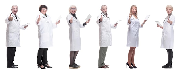 Group of doctors with clipboard isolated on white