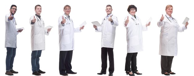 Group of doctors with clipboard isolated on white