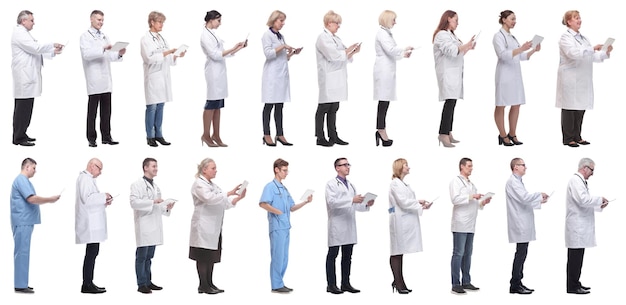 Group of doctors with clipboard isolated on white