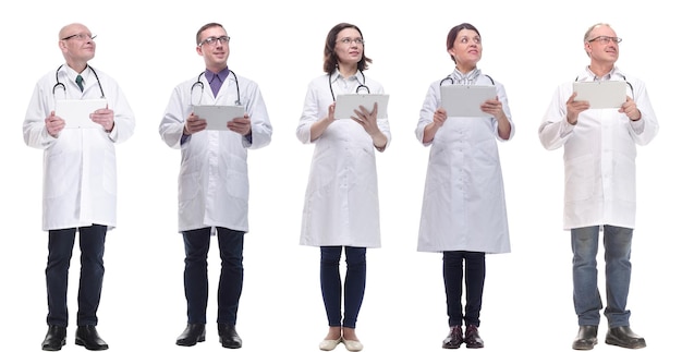 Group of doctors with clipboard isolated on white