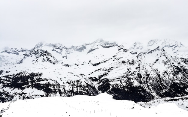 Group of Foggy Alpine Mountains around Mt.Gornergrat