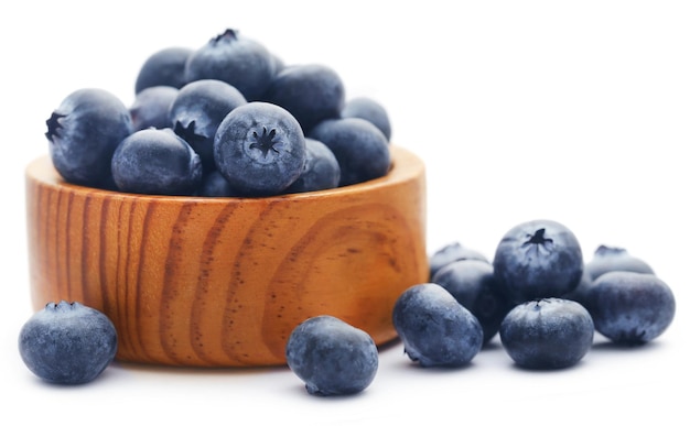 Group of fresh blueberries over white background