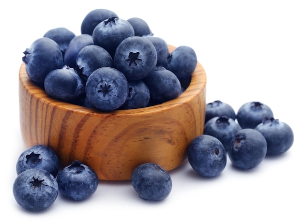 Group of fresh blueberries over white background