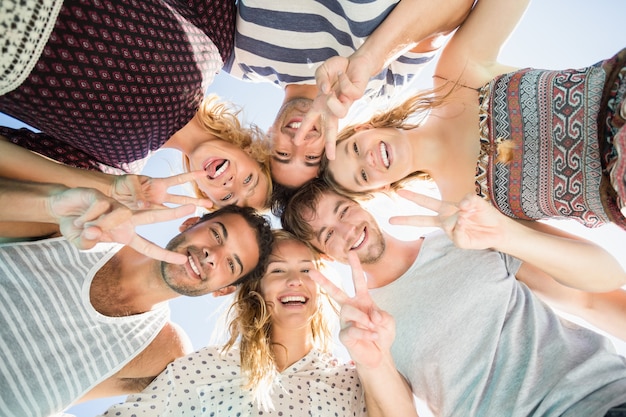 Group of friends forming a huddle