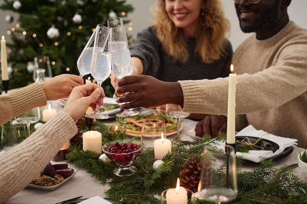 Group of Friends Having Drink at Christmas Festive Table