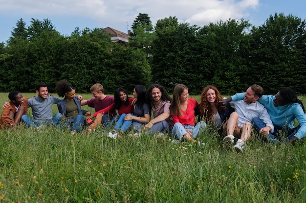 Group of friends having a fun time in the park together