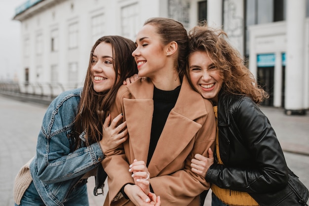 Group of friends posing together outdoors