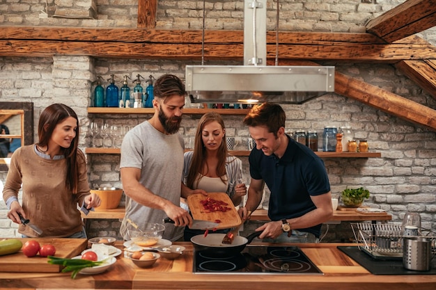 Group of friends preparing a meal together