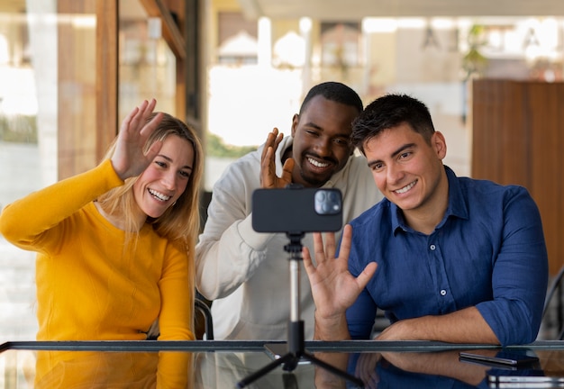 Group of friends reading cell phone messages