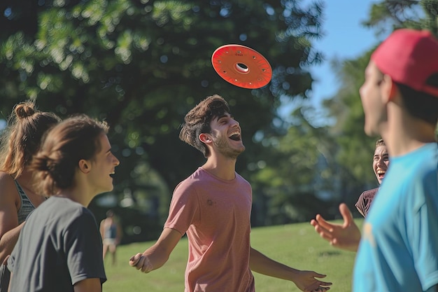 Photo group of friends sharing laughs and playing a game of frisbee in the park