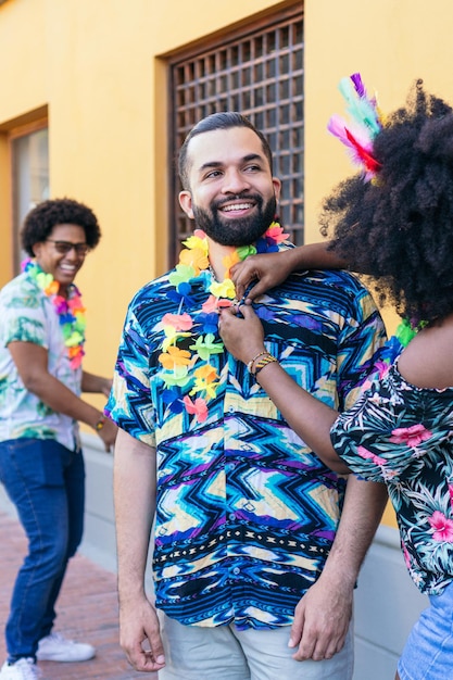 Group of friends in street carnival