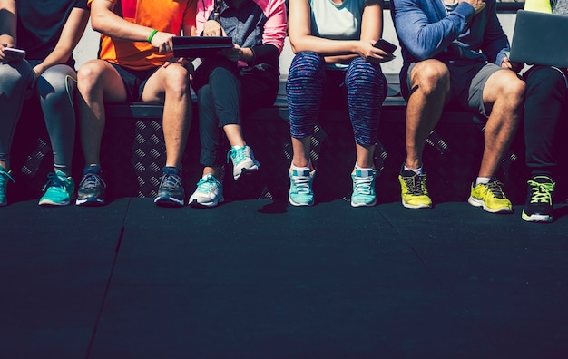 Group of friends working out at a gym