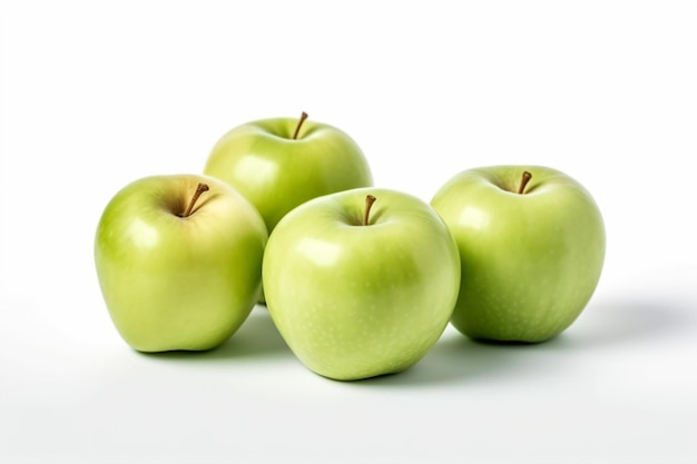 a group of green apples sitting on top of a white surface