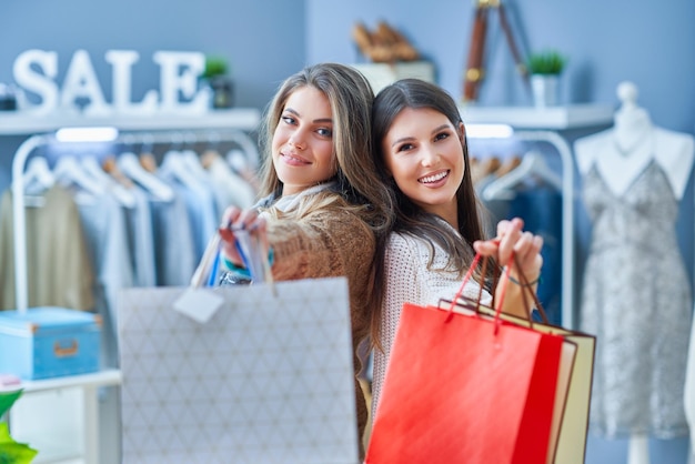 Group of happy friends during shopping. High quality photo