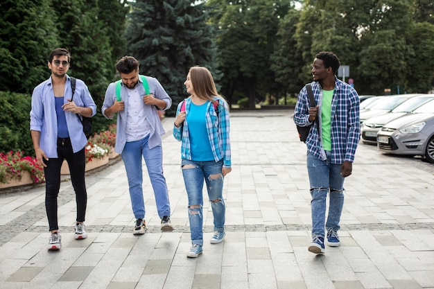 Group of high school students talking and laughing