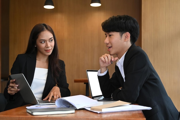 Group of human resources departments working together in modern office