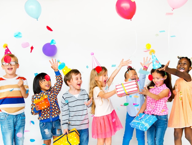 Group of kids celebrate party fun together