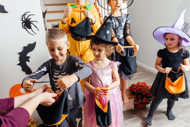 Group of kids waiting for Halloween candies