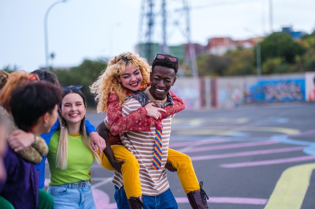 Group of lgtbi friends with vintage colored clothes