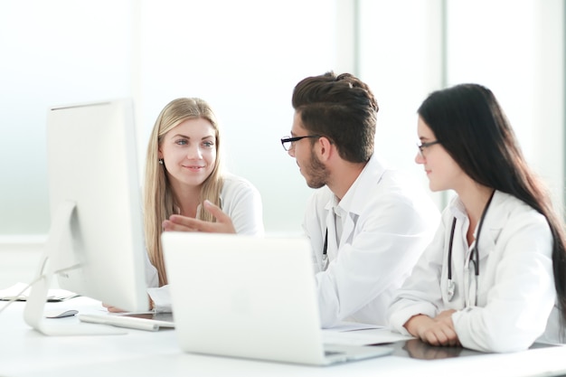 Group of medical experts discussing online information. technology and health