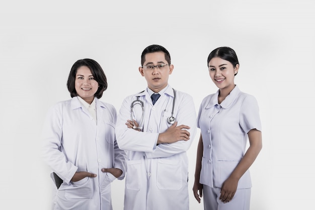 Group of medical staff smiling standing at the hospital.