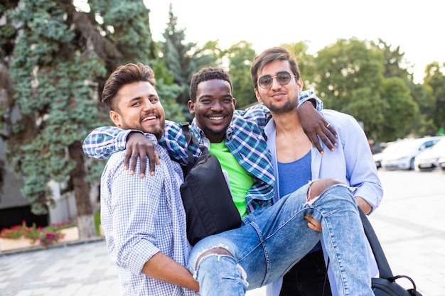 The group of multiethnic students have fun outdoors