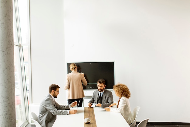 Group of multiethnic young business people working together in the office