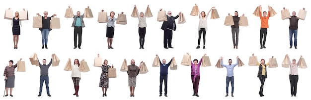 A group of people are running paper shopping bags