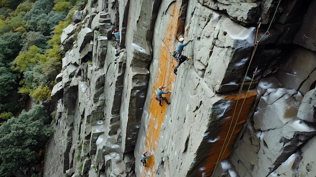 a group of people climbing a rock face with the word ice on it