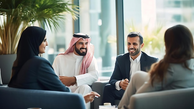 a group of people including a man with a black beard and a woman with long hair sit around a table in a meeting room a white bottle sits on the table and