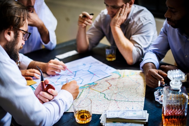 Group of people planning on robbing criminal