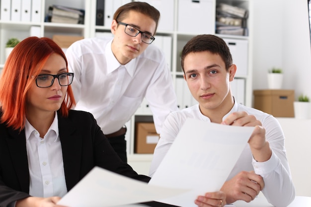 Group of people sit in office deliberate on problem portrait