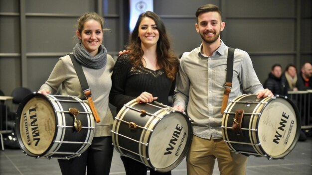 Photo a group of people with drums and a sign behind them that says quot wv quot