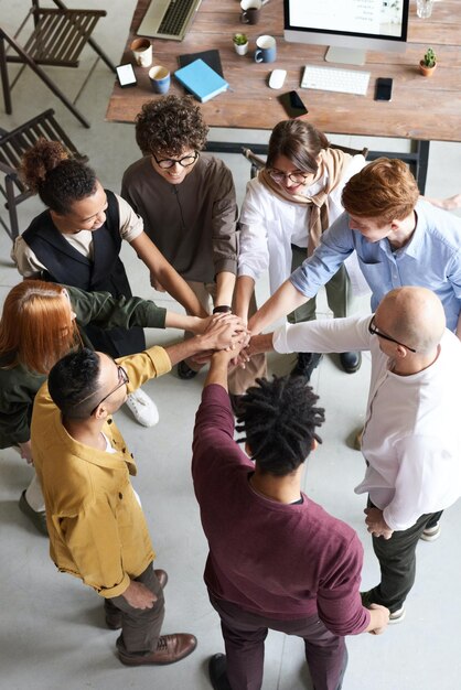 a group of people with one holding hands with one holding the other with the other holding hands