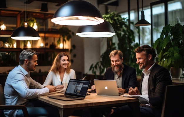 A group of people working on laptops at a table