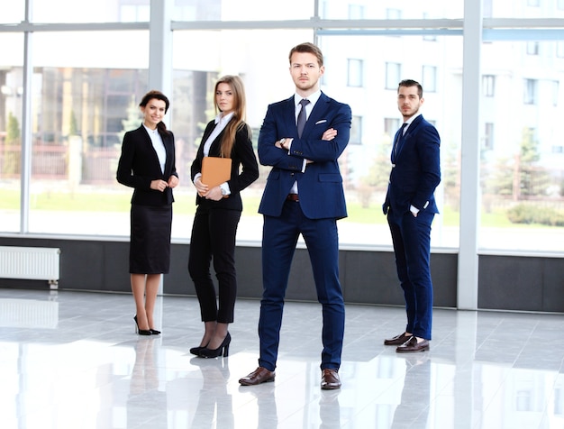 Group portrait of a professional business team looking confidently at camera