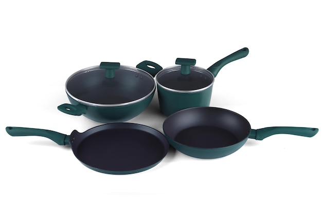 Photo a group of pots and pans with one being used to cook